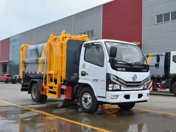 國(guó)六7方藍(lán)牌東風(fēng)D6側(cè)裝壓縮垃圾車